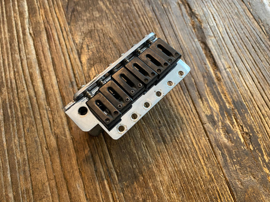 Stratocaster Style Tremolo Bridge | Chrome w/ Black Saddles, 2-7/32 Screw Spacing, 2-1/4 Screw Spacing